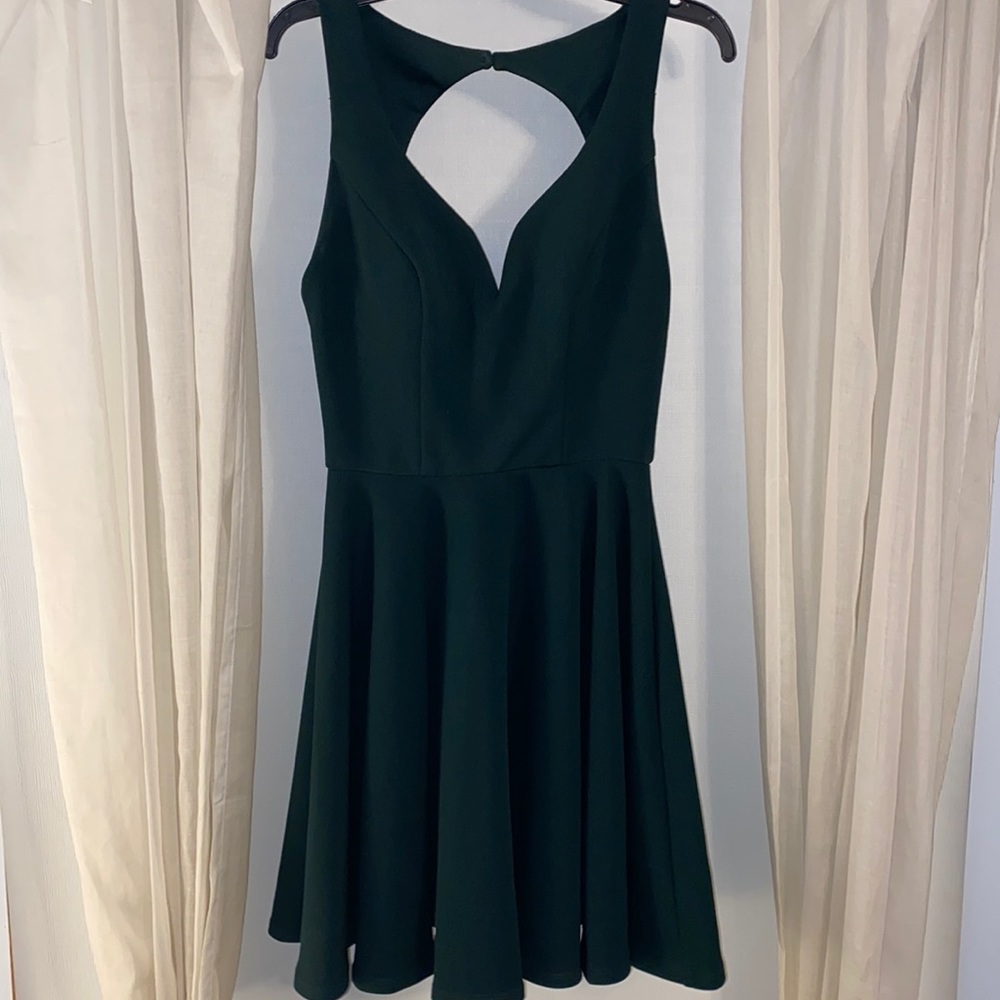 Hunter green homecoming dress. Size 1/2. Polyester/spandex.